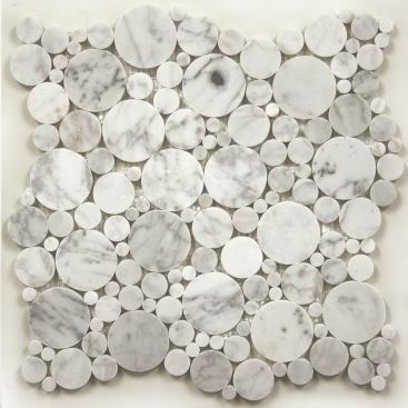Marme Canada  One can picture the Bubbles Bianco Carrara tile lining the walls of a shower stall or kitchen backsplash—or pretty much anywhere near water. The tile comes as polished marble pieces mounted on a 12-inch-by-12-inch mesh. 
www.marmecanada.com.