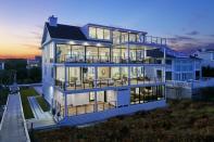 Marnie Oursler of Marnie Custom Homes designed and built the Surfside custom home in Bethany Beach, Delaware, featuring a clean and modern coastal vibe.