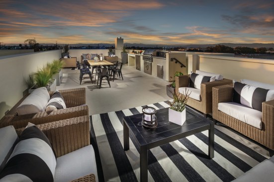 The rooftop decks at MBK Homes' Ebb Tide property include an outdoor kitchen suite of appliances.