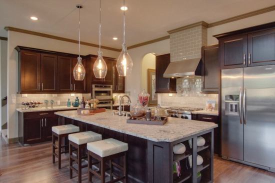 Casting a wide net when attracting buyers includes investing in kitchens built for serious cooking, family gatherings, and lots of hanging out. 