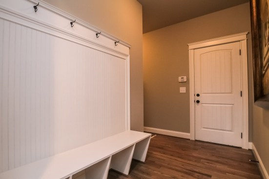 No
need to go through the laundry room when entering from the garage: it’s been
moved to the side, making way for a spacious mud room that offers outstanding
organization for coats, backpacks, and such.