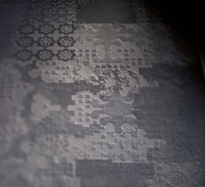 D&eacute;chirer, which is designed by Patricia Urquiola, is an unglazed porcelain tile collection that is inspired by the nature of cement. It features patterns that suggest apparent traces of previous stratifications as well as different reliefs, levels, and textures, which results in a tile that begs to be touched. A wide variety of styles, sizes, and colors are available. 
www.mutina.it.