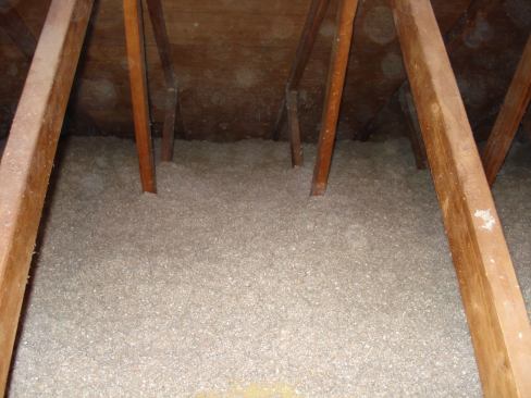 After air sealing with spray foam, contractors blew in 13 inches of cellulose insulation, which should go a long way towards making my house more energy efficient and lowering my electric bills.