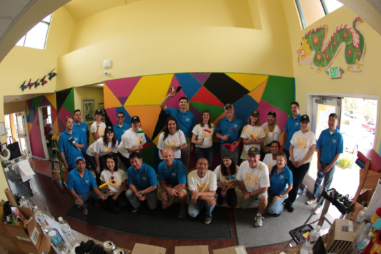 Teams of employees from KB Home and Sherwin-Williams worked together to paint this mural at the Salvation Army Bessie Pregerson Child Care Center in Los Angeles.