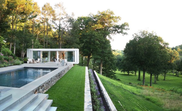The retreat serves as an office, poolhouse, studio, and entertainment space