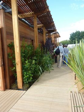 Decking surrounds the house providing various levels of intimate or open outdoor spaces.