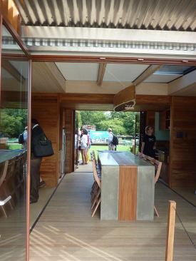The decking runs not only around the house but also through the center, allowing occupants to effectively live outside during summer and bringing a sense of the outdoors inside during winter.