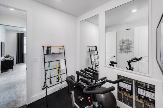 Located right off the owner’s suite, the pocket gym offers a rightsized space to work out.