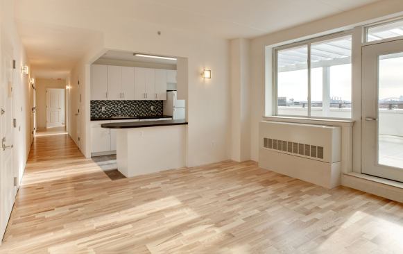 Interior walls contain R-15 Knauf recycled fiberglass insulation. Outside, masonry cavity walls and precast concrete plank construction allowed for about 2¼ inches of Dow rigid XPS foam. The building achieved a HERS rating of 41.