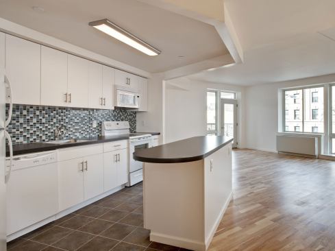 Energy Star appliances, Moen faucets with 1-gpm aerators, and tile flooring are some of the sustainable products in the Melody’s bright and open kitchens.