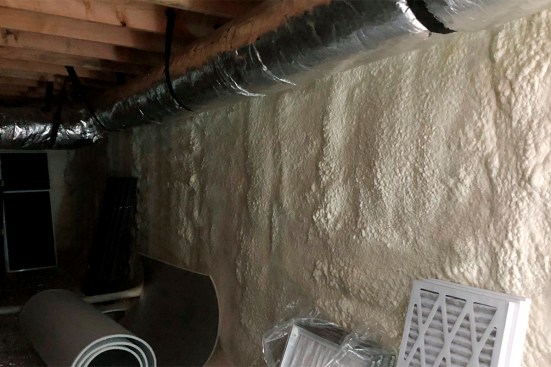 Owens used extensive spray foam insulation, especially in the existing crawl space and attic, to achieve a tight, well-insulated envelope.