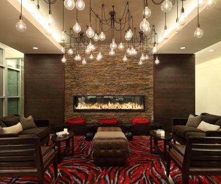 Light movement from the fireplace is enhanced by this scattered arrangement of hanging bulbs, creating both visual interest and a flattering glow.


Architect: Design Collective, Baltimore

Builder: The Bozzuto Group, Greenbelt, Md. 

Interior designer: RD Jones and Associates, Baltimore