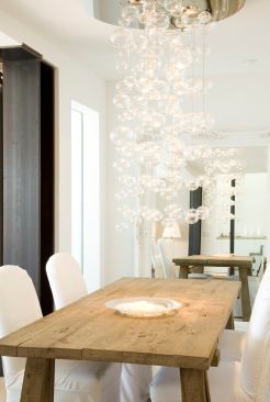 This contemporary chandelier adds light and plenty of extra sparkle to the dining area while keeping up with the home’s modern interior. Architect: Mark English Architects, San Francisco Builder: Landmark Builders, Novato, Calif.