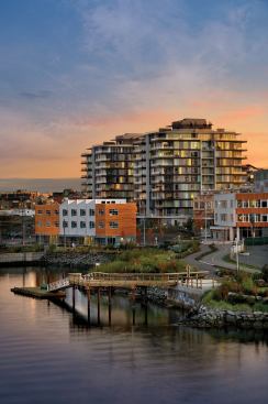Perkins+Will developed the community master plan for the 15-acre mixed-use Dockside Green in Victoria, B.C., a LEED-ND pilot project on a former brownfield site on Victoria Harbor. It features pedestrian and bike trails, a mini-transit system, and a boat launch and dock facilities.