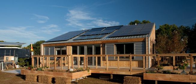 Show off the team's Midwest roots, the exterior and deck of the Iowa State Interlock House are made of locally harvested cedar.