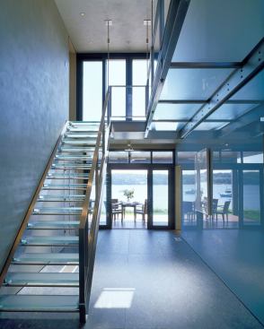 In this Martha’s Vineyard vacation home, views are of the essence. Even the staircase, designed by Hutker Architects, lent to the cause with a breezy frame and transparent treads that don’t obstruct the scenery. However, in its effort to preserve sightlines, this glassy installment’s sleek design becomes a vista in its own right.