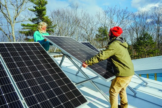Kelly saved cost by installing the PV brackets and panels.