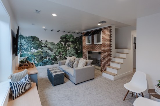 From the play area in the basement to the built-in workstations on the second floor, the home caters to both children and adults.