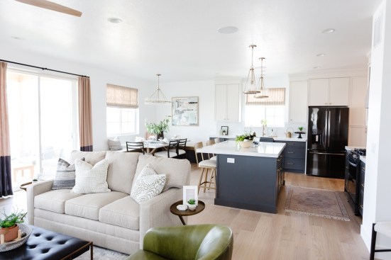 On the home’s main floor, the kitchen, dinette, and living room are combined to create one large great room for a family to gather.