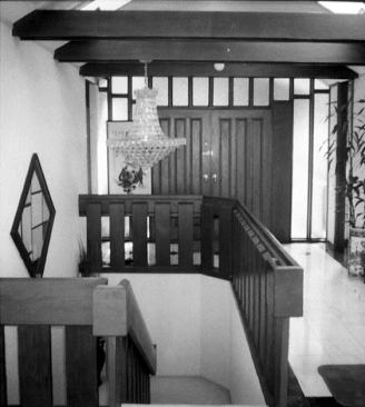 The stair down to the lower level was also reorganized so that skyline views could be seen from the front door.