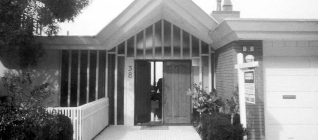 The street-level entry was pared down and simplified, both inside and out, in order to emphasize its angular architecture.