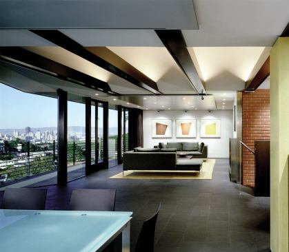 Interior walls were eliminated and storage areas were recessed into the walls so that views from all living spaces would remain unobstructed and open.