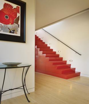 While the stair’s form derives from a Japanese archetype, its red lacquer finish speaks of China.