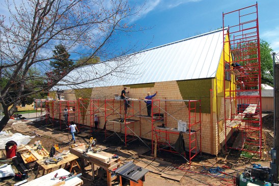 Fruits of Their Labor Studio 804 students work to build the house in East Lawrence, which is targeting LEED Platinum and Passive House. Many will stay past graduation to finish the project.