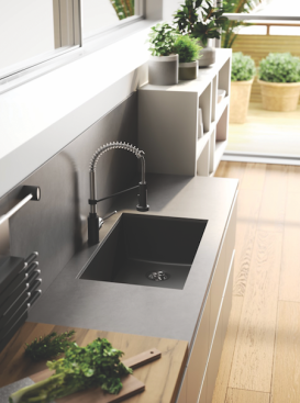 Thin showerheads and quartz sinks are two ways to incorperate modern interior design into any K&B space.