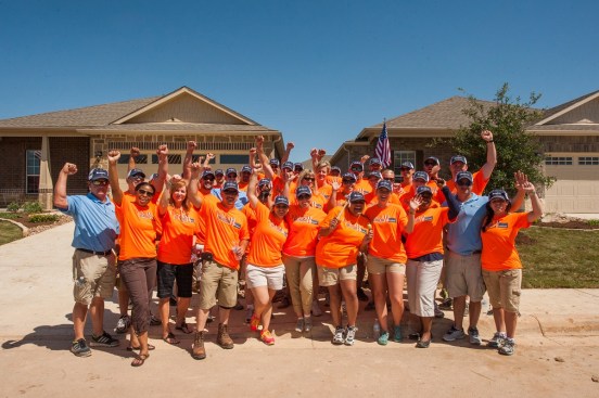 PulteGroup’s San Antonio team surprises two Purple Heart recipients and their families at the dedication event for their new mortgage-free Built to Honor homes.