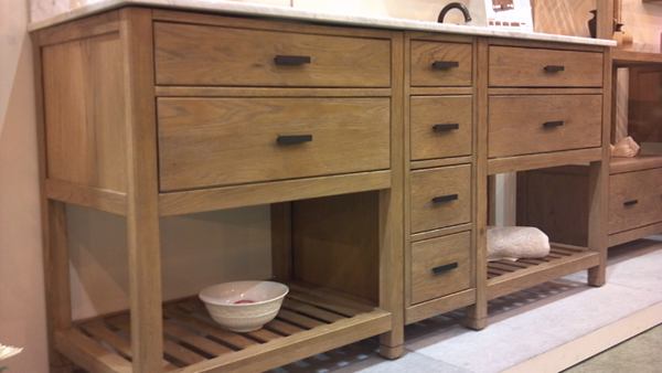 Refined Rustic Sagehill Designs unveiled the Toby collection of bath furniture, including counters, cabinets, mirrors, and etageres. Steven Wilcox, who designed the line, says the collection reflects today's use of rougher, more rustic wood species, but in a more modern, less-than-rustic furniture style.
Sagehill Designs | sagehilldesigns.com