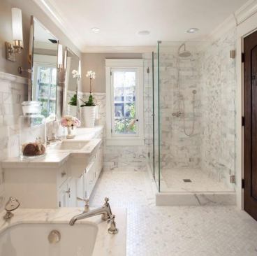A shallower-than-standard vanity cabinet provides clearance at the window and comfortable access to the shower. 