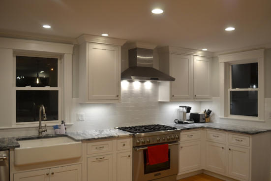 Task. Downlights placed in the ceiling in front of the cabinets work best when used along with under-cabinet LED lighting.