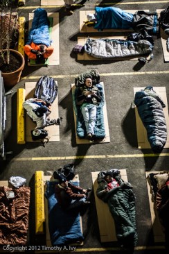 A few times a year, Gaffney (center) sleeps on the street with other advocates to draw attention to the problem of homelessness among teens.