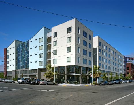 Described by the architect as a “landscraper,” this assemblage of 170 affordable and 54 market rate apartments and townhomes occupies an entire block in a semi-industrial part of San Francisco. It’s a massive structure, but it doesn’t feel foreboding, thanks to alternating materials and roof lines that break its facades into human-scale vignettes. The building’s street edges are lined with active mixed uses, and the site includes an art-lined green space. It’s also flanked by a path for walkers and cyclists that connects to Mission Bay and downtown. 
Project: 888 Seventh St., San Francisco 
Architect: David Baker + Partners 
Contractor: Roberts-Obayashi Corp.