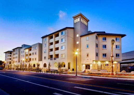 Designed as workforce housing for families earning 20% to 50% of the area median income, Trestle Glen is a transit-oriented apartment community adjacent to the Colma BART station. The GreenPoint rated property integrates a number of green features, including solar panels to preheat domestic hot water, bio-swales that naturally filter rainwater, and a community recycling program. During construction more than 80% of waste generated was recycled and diverted from landfills. The 2.7-acre parcel was once a mobile home park housing 42 individuals and families; now the same site serves 119 families, and a second phase of development has 32 entry-level townhomes in the queue.

Project: Trestle Glen, Oakland, Calif.

Architect: KTGY Group

Builder: BRIDGE Housing

