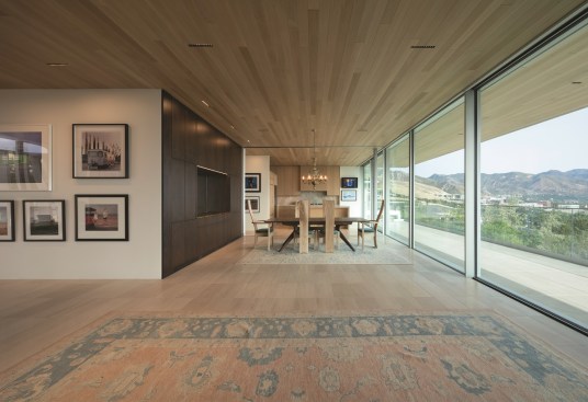 An open floor plan, bright natural light, and flush thresholds make this house by Sparano + Mooney Architecture pleasant to live in for all ages.