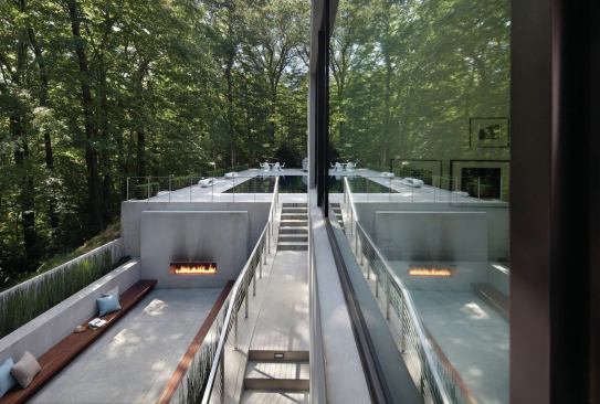 The outdoor kitchen is command central for catered parties, which often begin with cocktails in the adjacent sunken garden.