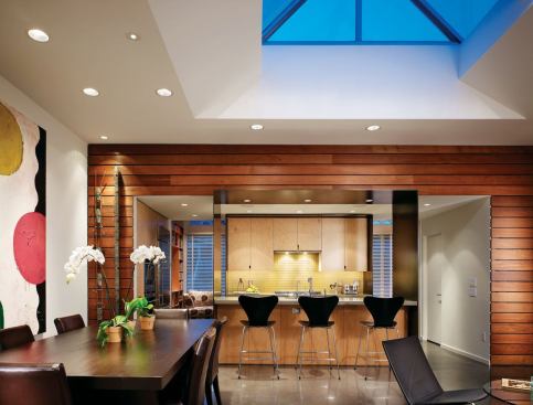 Two pocket doors on the street side of the ipe container allow for two-zone heating and divide the public and private realms.