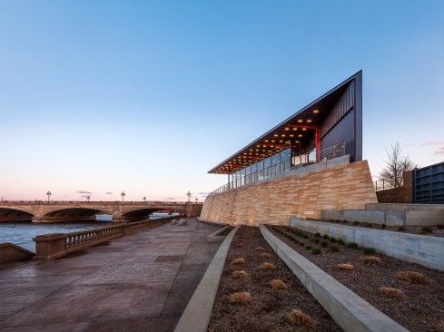 The triangular building was conceived as a crystalline space resting at the prow of a gently sloping, boat-shaped plaza formed by the adjacent trails, streets, promenades. 