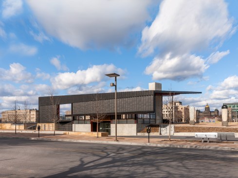 The building activates the public plaza and creates an understandable "place" according to Mankins. 