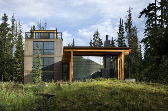 This vacation home consists of two connected pavilions--one designed to capture nearby forest views; the other, distant mountain vistas.
