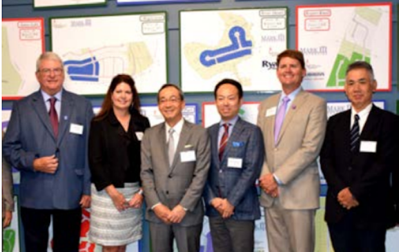 Sumitomo Forestry North America execs celebrate with principals of Mark III, John Beeson, Laura Beeson Henthorn, and Jay Beeson [2nd from right].