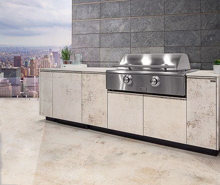 The TECNO Collection by Brown Jordan Outdoor Kitchens, made in collaboration with designer Daniel Germani, features Dekton by Cosentino countertops and matching powder coat finishes. Shown: Nillium finish.