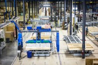 Bensonwood's Tektoniks plant,  a new 110,000 sq ft. panel fabrication facility in nearby Keene, N.H. to support the expansion of both Bensonwood's custom timberframe home building business and its six-year-old Unity Homes,