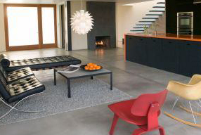 This modern, eco-minded house keeps things simple, using no chemicals, carpets, tiles or paint. Fun features include floating blue silicon stair treads, recycled rubber sinks... Architect: MINARC Builder: Lannen Construction