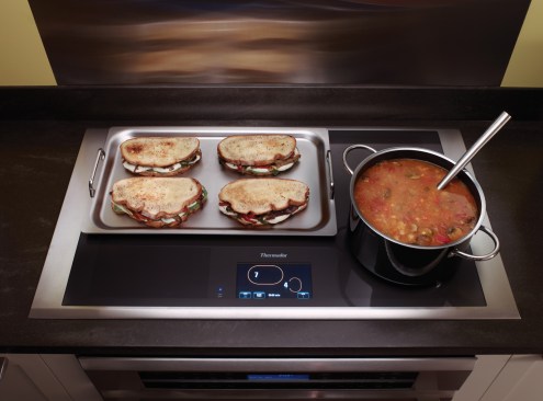 The 36 inch Masterpiece Series Freedom induction cooktop from Thermador uses 48 3-inch coils to provide more usable cooking space.