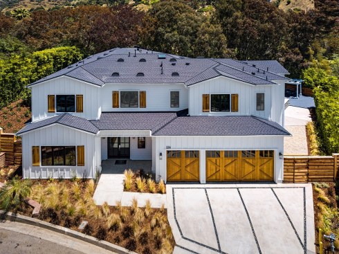 A 5,520-square-foot, five-bedroom, eight-bath modern farmhouse built by Thomas James Homes in Beverly Hills, California.