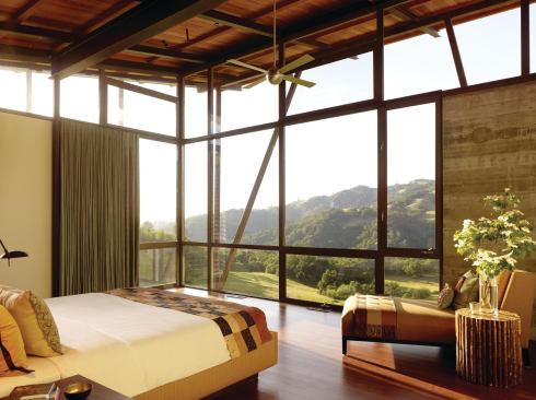 The master bedroom view extends to a wooded ridge nearly a mile away.