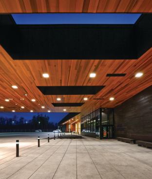 Public and inspection areas are defined by natural stained cedar.